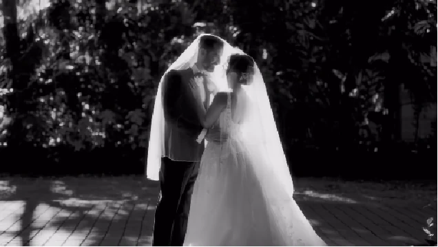 Karla and Matthew under the bridal veil at Villa Bokeh