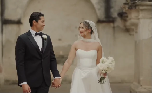 Gina and Brian holding hands at their Villa Bokeh wedding