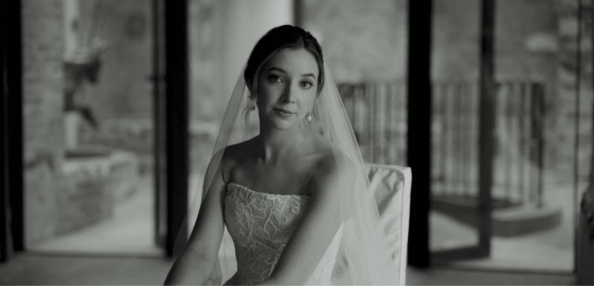 Black and white portrait of a bride in her veil